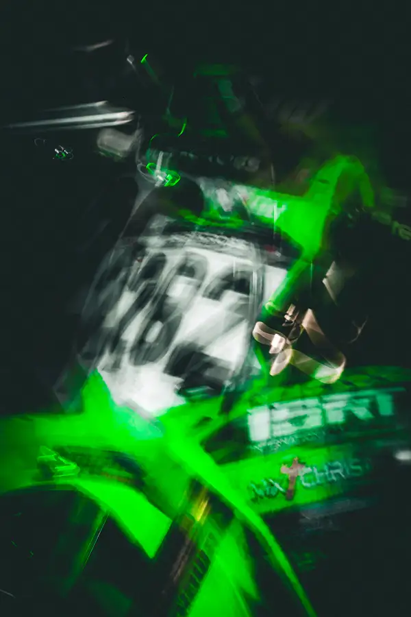 Football player blurred with neon green light streaks