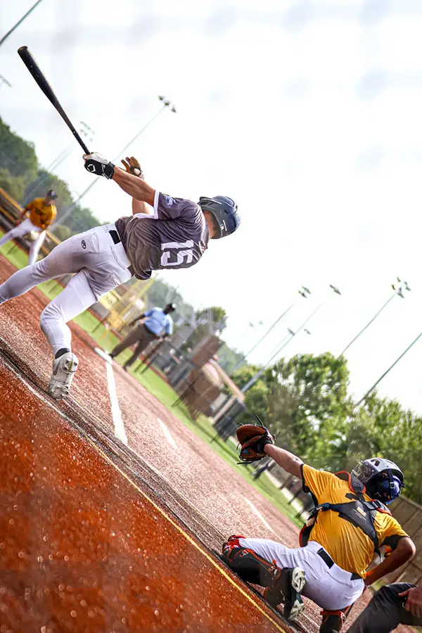 Tilted frame of a batter's swing at home plate